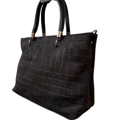 Bolso shopper de antelina con asas cortas y asa bandolera extraíble.