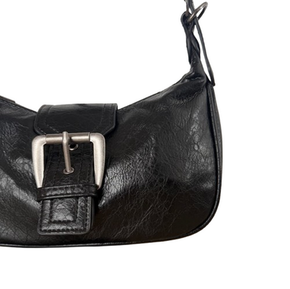 Bolso bandolera en negro con hebilla – Estilo vintage y asa regulable