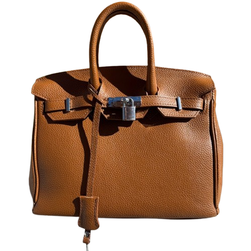 Bolso de piel de mano y cierre metálico.
