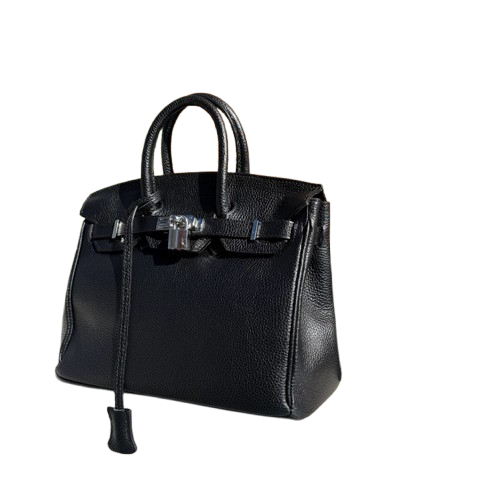 Bolso de piel de mano y cierre metálico.
