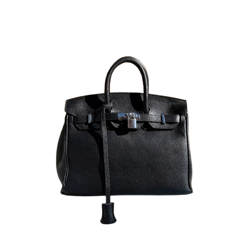 Bolso de piel de mano y cierre metálico.