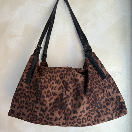 Bolso Animal Print Marrón con dos asas graduables.