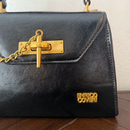 Mini bolso con detalle de cierre de cadena dorada + asa bandolera