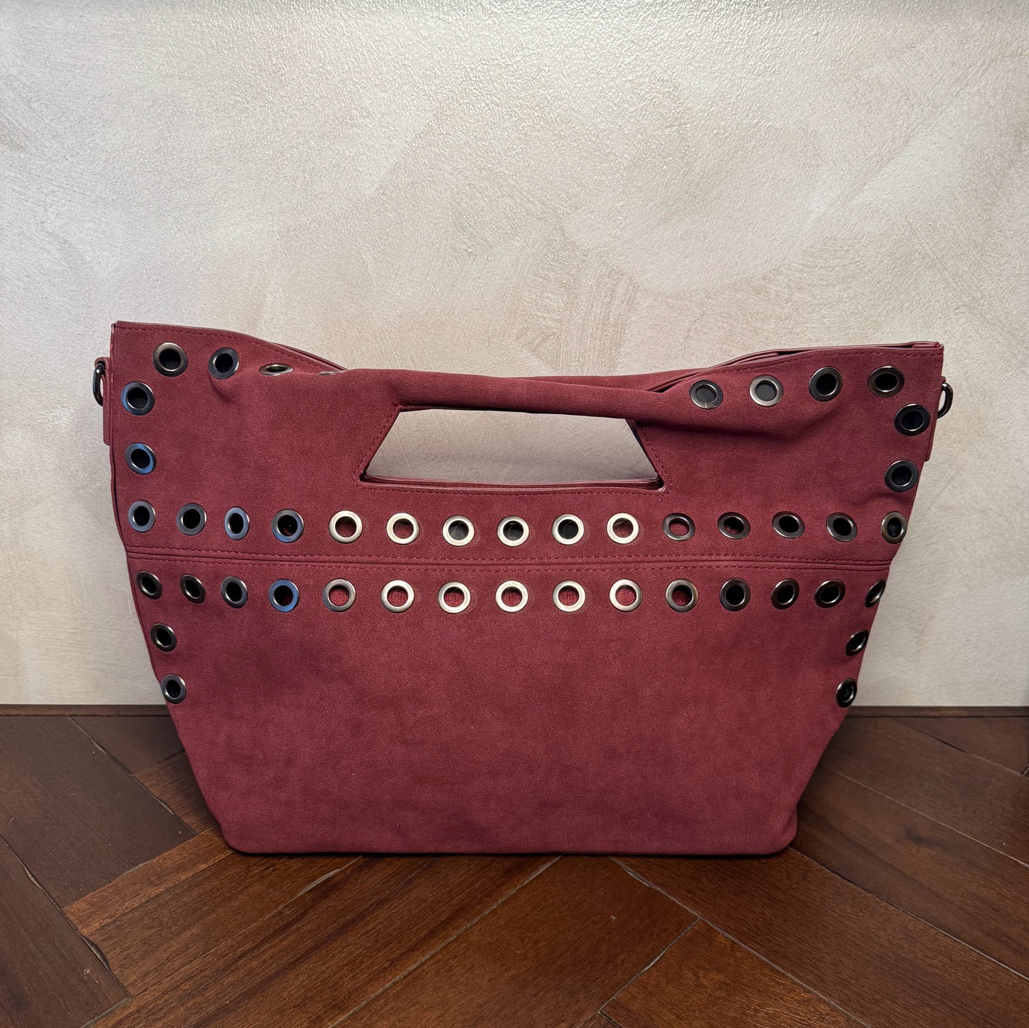 Bolso shopper con ojales metálicos