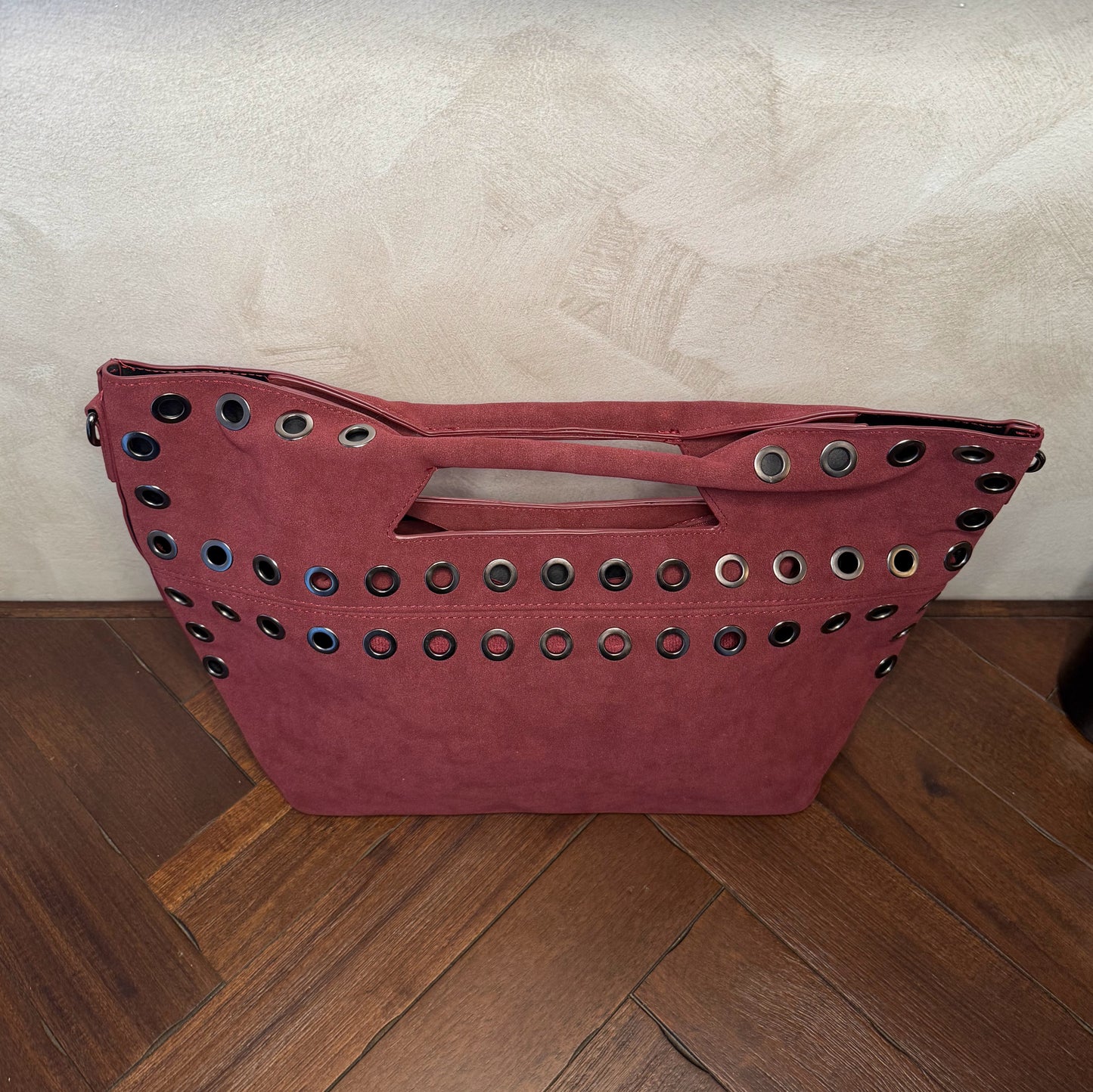 Bolso shopper con ojales metálicos