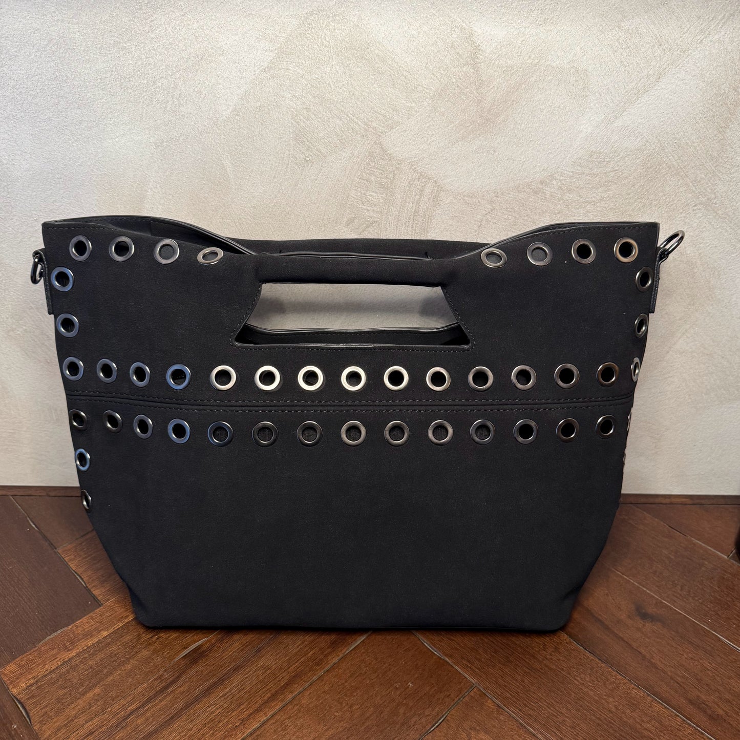 Bolso shopper con ojales metálicos
