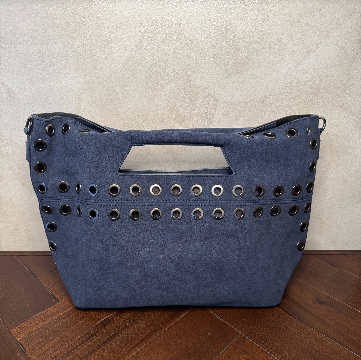 Bolso shopper con ojales metálicos