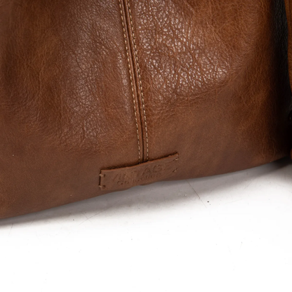Bolso shopper con tachuelas + neceser.