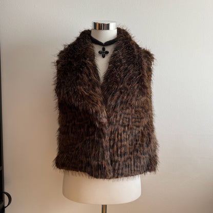 Chaleco de pelo super suave con bolsillos de leopardo.