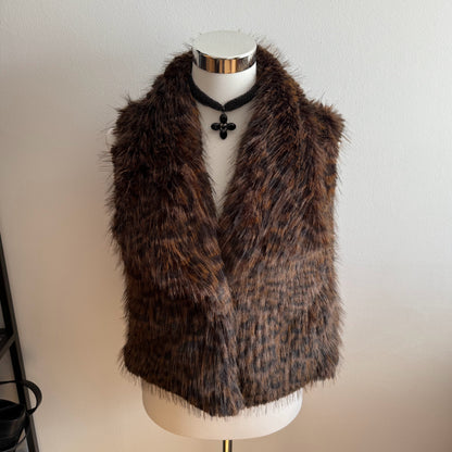 Chaleco de pelo super suave con bolsillos de leopardo.
