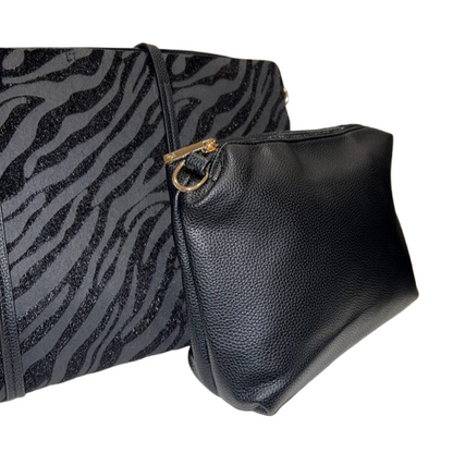 Bolso shopper negro reversible con estampado cebra glitter