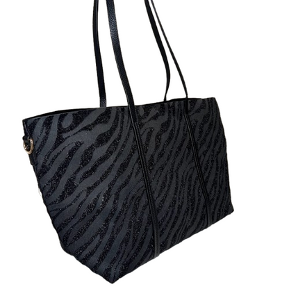 Bolso shopper negro reversible con estampado cebra glitter