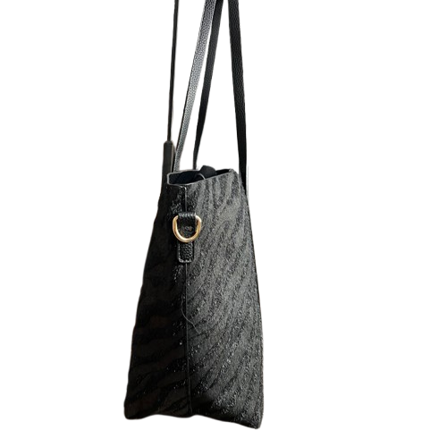 Bolso shopper negro reversible con estampado cebra glitter